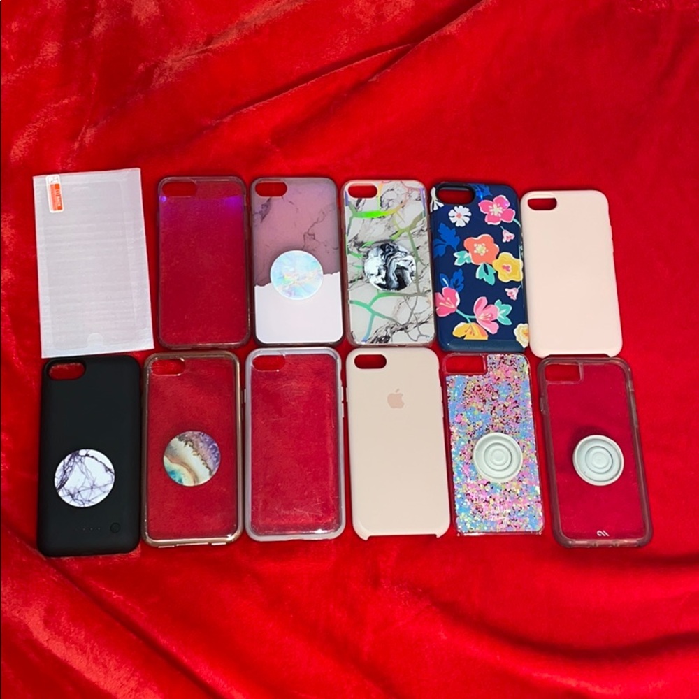 11 phone cases, 6 popsockets and screen protecter